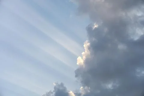Sunlight shining in cloud on blue sky Stock Photos