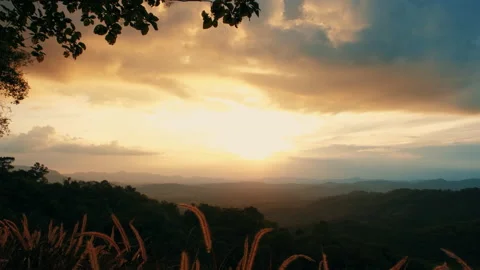 Sunlight shining over mountain with cloud in the evening Stock Footage 142678142
