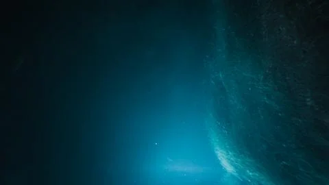 Sunlight shining ,the surface and under the blue ocean, sea wave , with cle.. Stock Photos