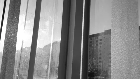 Sunlight shining through the blinds window black and white. Blinds panoramic Video stock 319778851