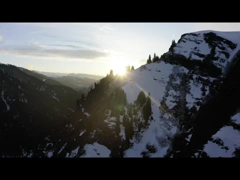 Sunlight Shining Through Mountain Peaks, North Xinjiang, China Stock Footage 304080390