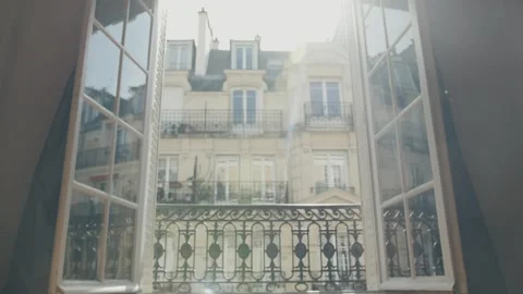 Sunlight shining through open window in paris apartment Stock Footage 310874662