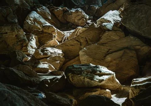 The sunlight shining through Stalagmites inside Cave of Hup Pa Tat. Stock Photos