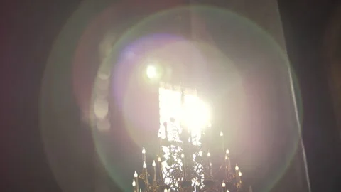 Sunlight Shining Through Window onto Church Chandelier Stock Footage 312143968