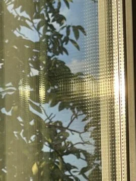 Sunlight shining through the window Stock Photos