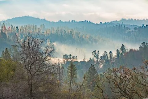 Sunlight Shinning Through the Clouds Stock Photos