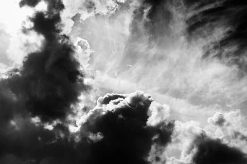 Sunlight sky with dark storm clouds Stock Photos