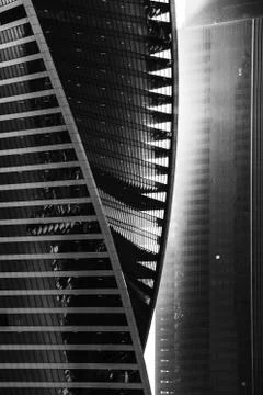 Sunlight on skyscraper. Glass Tower, high-tech, light rays. Monochrome, black Stock Photos