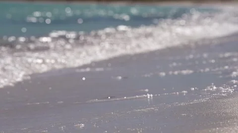 Sunlight Sparkles on Close-Up Ocean Waves Stock Footage 305957673