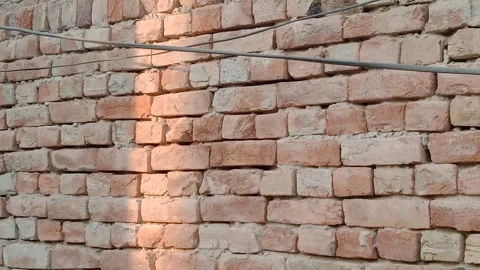 Sunlight spreading across wall surface Видео 347990924