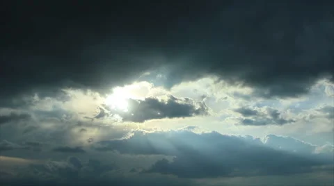 Sunlight at stormy sky Stockbeeldmateriaal 58736728