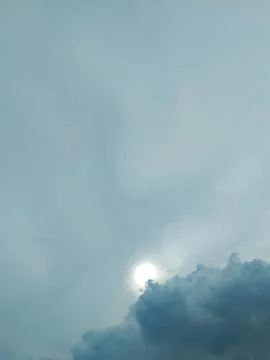 Sunlight streaming through storm clouds creating an ethereal glow Stock Photos