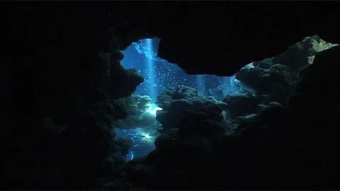 Sunlight Streaming Into an Underwater Cave Stock Footage 300936982