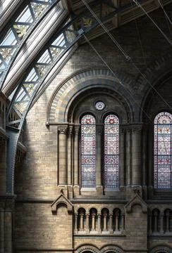 Sunlight streams through the arched windows of a building, creating distinc.. Stock Photos