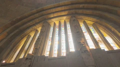 Sunlight streams through a stained glass window, Battle of Nations Monument Stock Footage 319756266