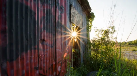 Sunlight through an abandoned shed Video stock 69009242