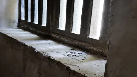 Sunlight Through the Ancient Stone Window Stock Footage 317474504