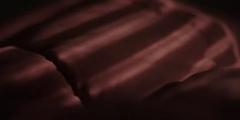 Sunlight Through Blinds Shimmer on a Blanket Stock Footage 281342929
