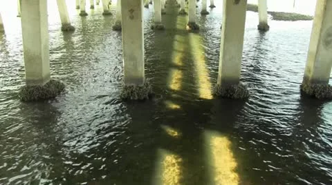 Sunlight through bridge gap Stock Footage 12614627