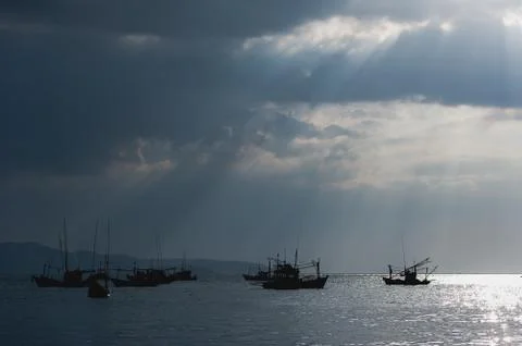 Sunlight through the clouds Stock Photos