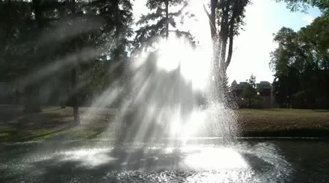 Sunlight Through Fountain Video stock 12614248
