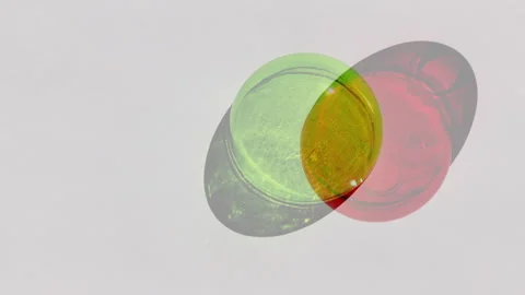 Sunlight Through Geometric Objects with Green and Purple light Stock Footage 305075319