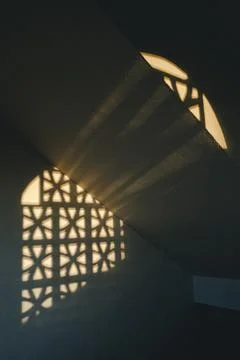 Sunlight Through Geometric Patterns Stock Photos