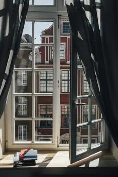 Sunlight through an open window Stock Photos