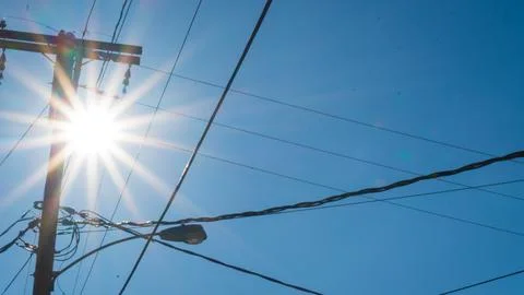 Sunlight Through Power Lines Stock Photos