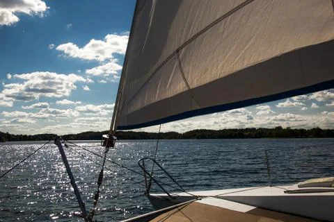 Sunlight through the sails of a sailboat Stock Photos