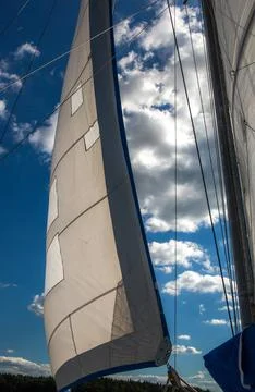 Sunlight through the sails of a sailboat Stock Photos