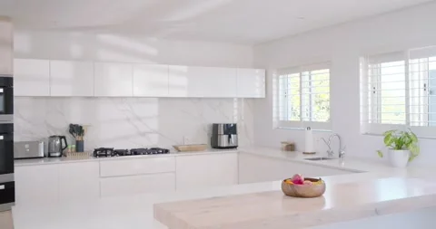 Sunlight through shutters is shifting, camera is moving forward, bringing wooden Stock Footage 336686326