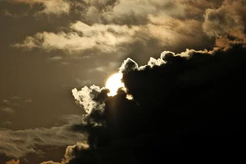 Sunlight Through Storm Clouds Stock Photos