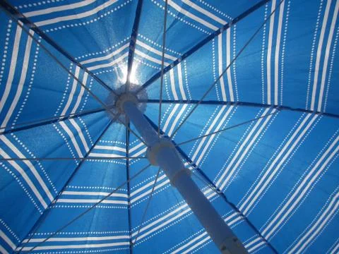 Sunlight through umbrella Stock Photos