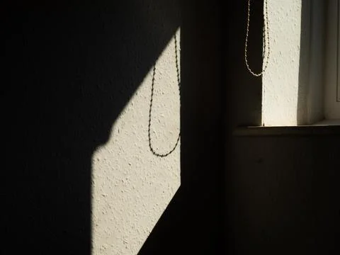 Sunlight through view of window blinds in hallway Stock Photos