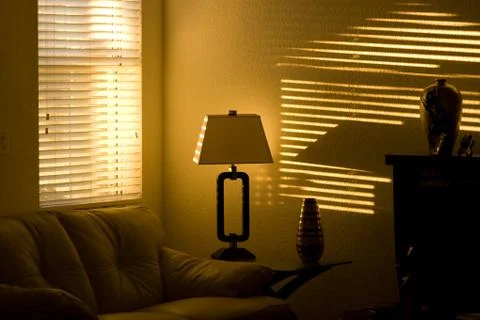 Sunlight through window blind Foto stock