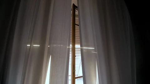Sunlight through the window. Slow motion. Stock Footage 122990393
