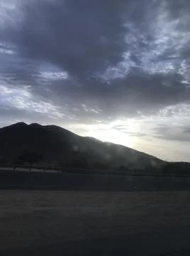 The sunlight view behind the mountain Stock Photos