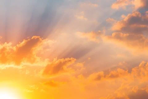 Sunlight in warm summer sky Stock Photos