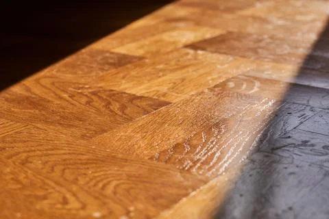 Sunlight from the window on the parquet floor Foto stock
