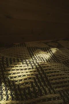 Sunlight on woven fabric pattern Stock Photos