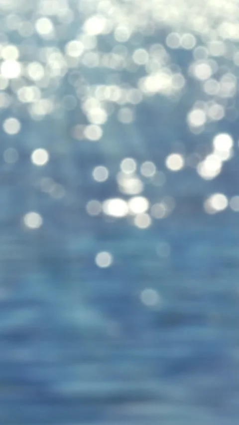 Sunlights over blue water Stock Footage 263138169