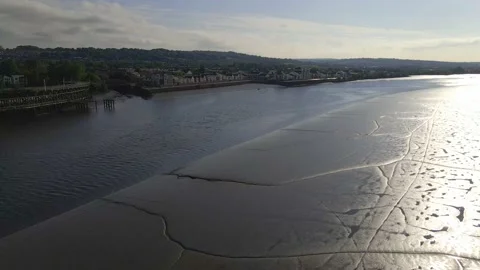 Sunlights reflects off a muddy River Tyne near Dunston Staiths Video stock 132910466