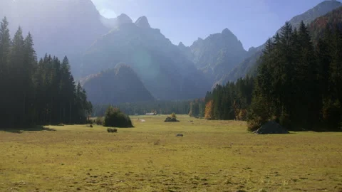 Sunlit Alpine valley Stock Footage 258957327