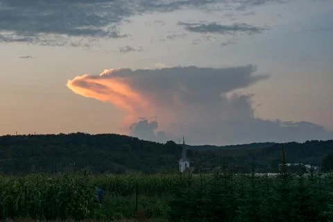 Sunlit anvil of a thunderstorm Stock Photos