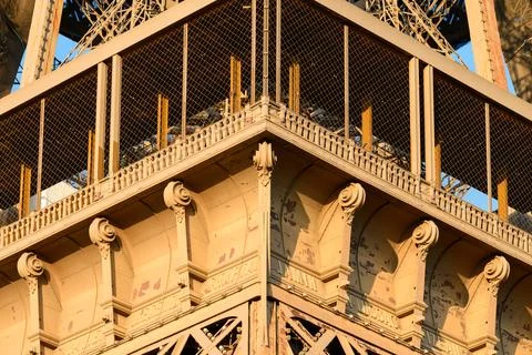 Sunlit architectural corner of Eiffel Tower platform Stock Photos