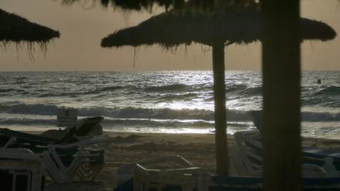 Sunlit Beach at dawn Foto stock