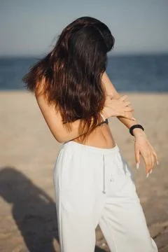 Sunlit beach Stock Photos