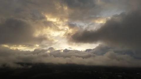 Sunlit Break Through Dense Cloud Layer Video stock 321791600