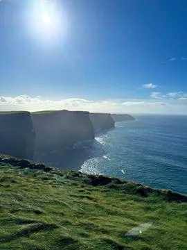 Sunlit Cliffs Overlooking the Endless Atlantic Stock Photos